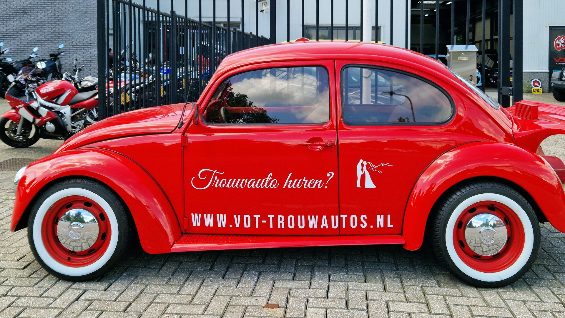 File:Red Volkswagen Beetle side view.jpg