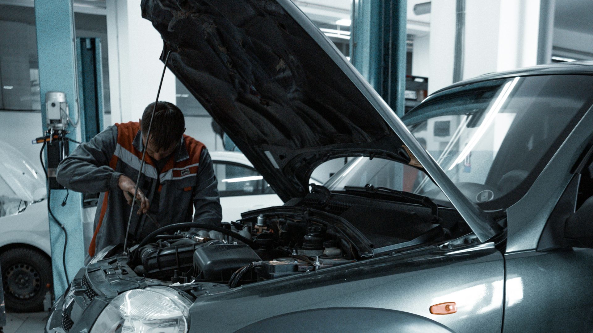 black suv in a garage