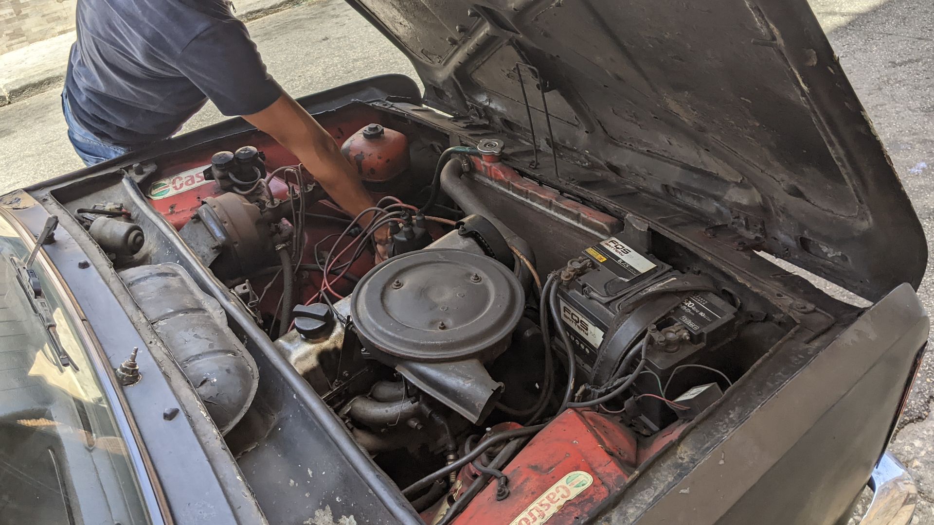 File:A Cuban man working on an engine.jpg