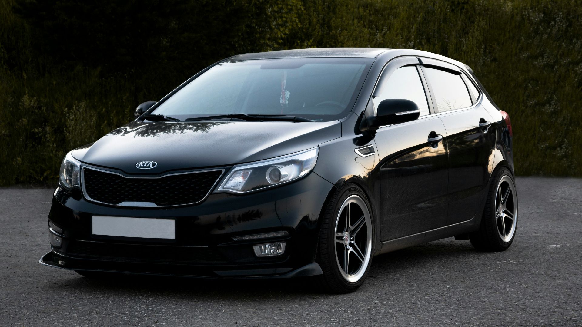 black mercedes benz c class on road during daytime