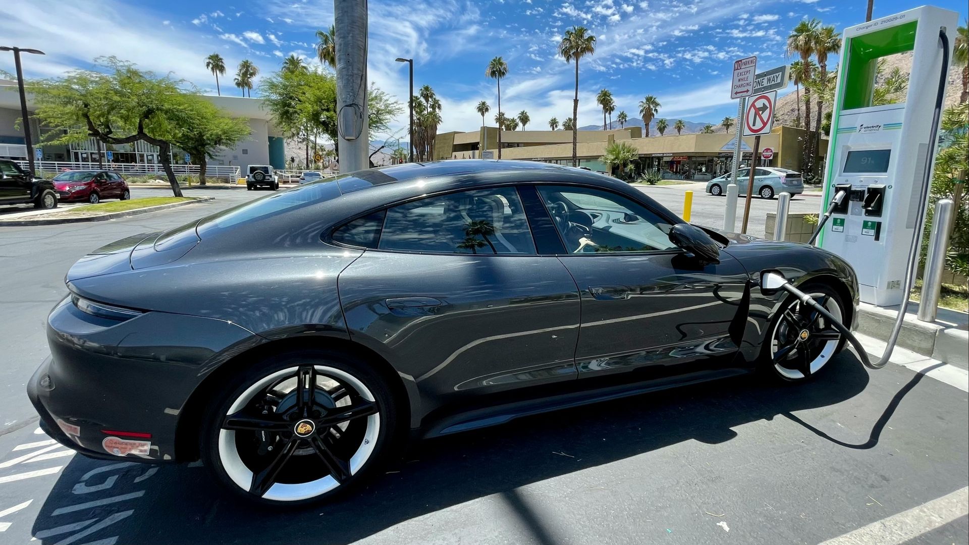 black sedan on road during daytime