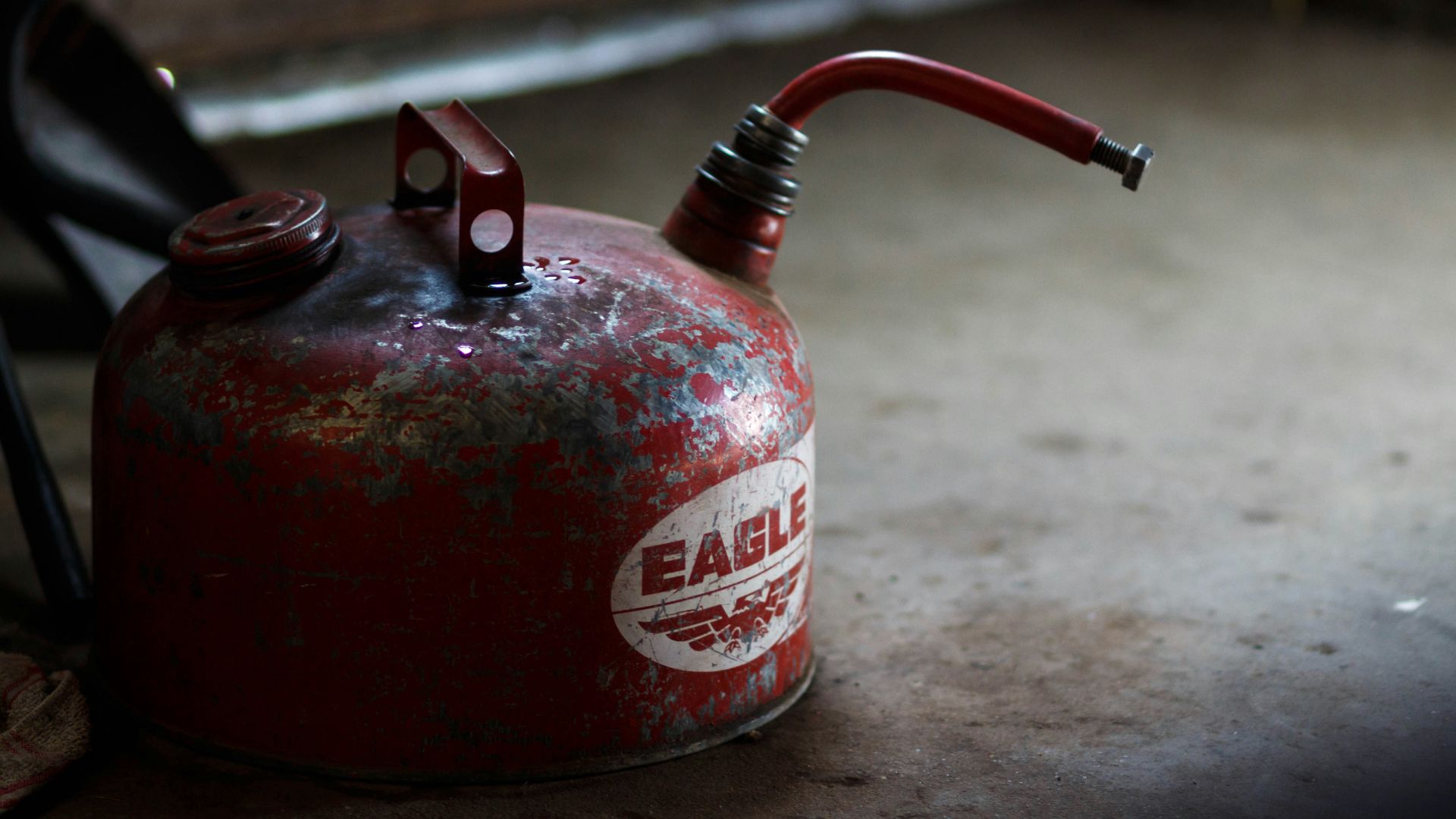 red and white plastic spray bottle