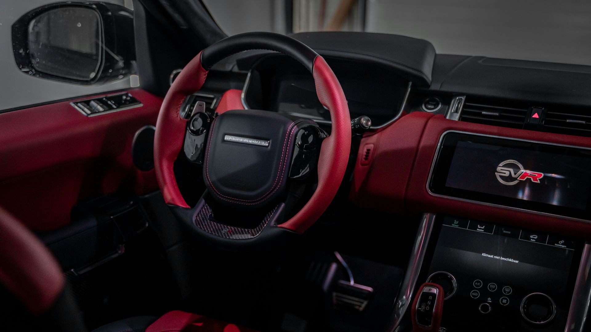red and black steering wheel