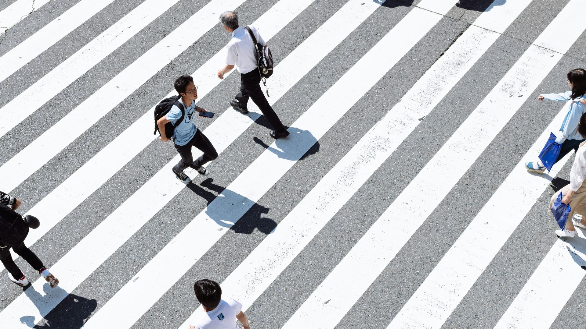 crowding people crossing on pedestrian lane