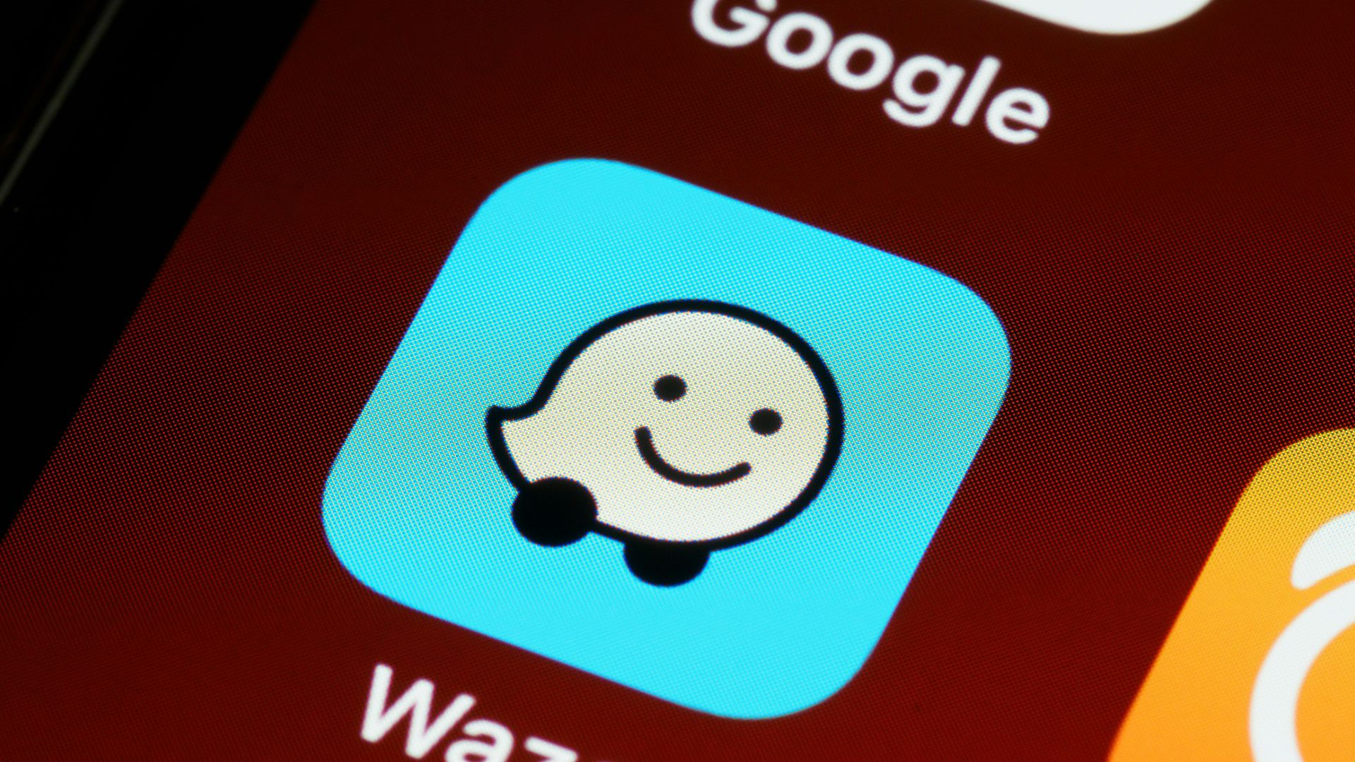 black smartphone showing icons with icons