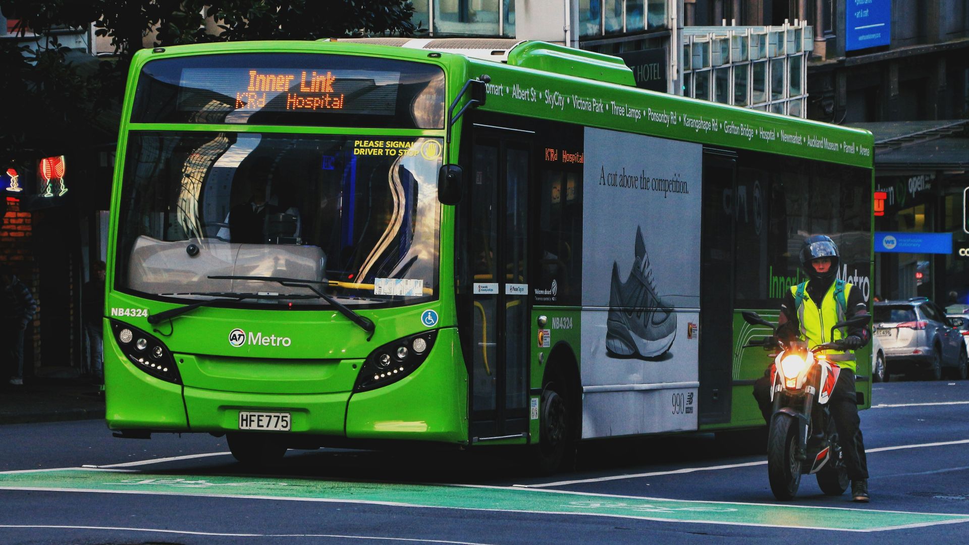 green bus on road
