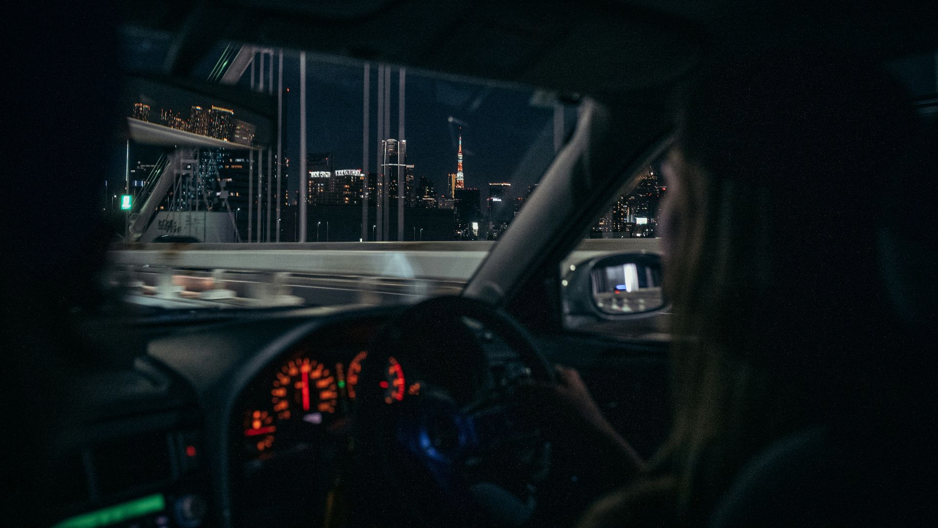 Driving through a city at night