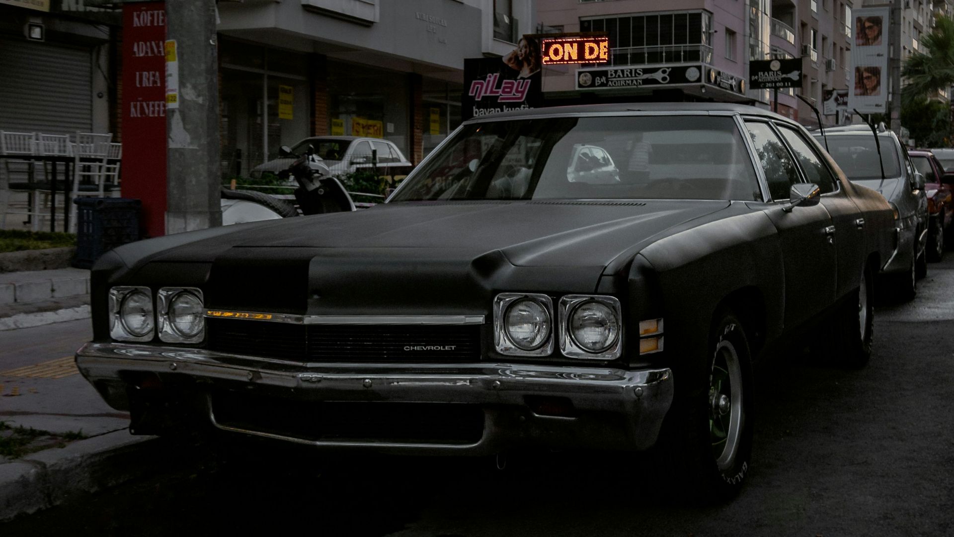black coupe on road during daytime