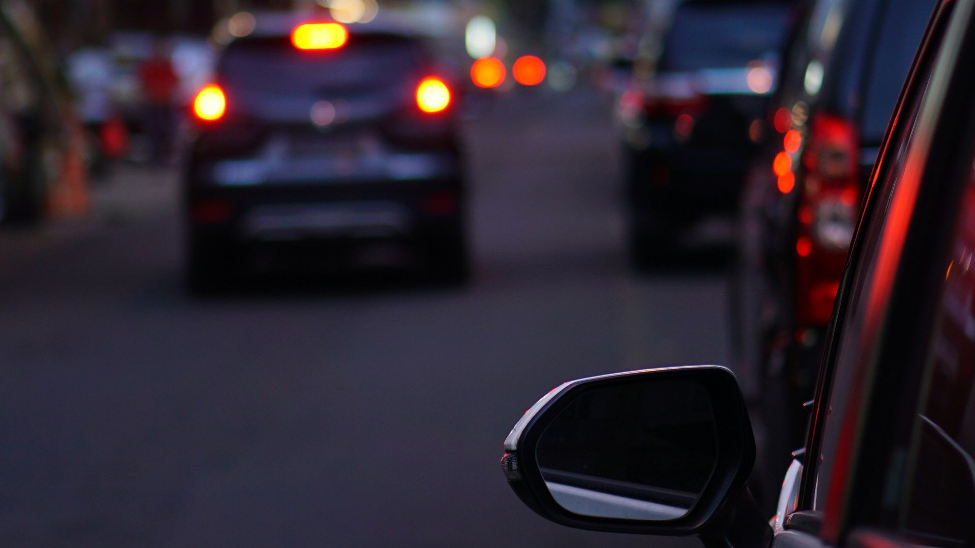 a city street filled with lots of traffic