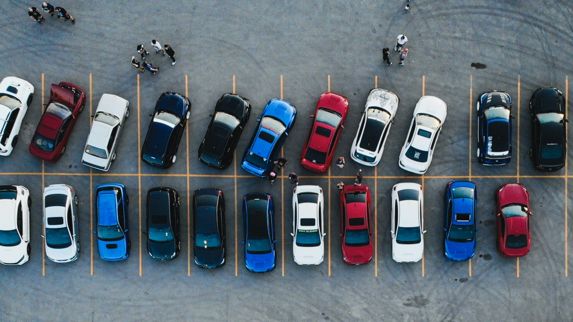 cars parked on parking lot during daytime