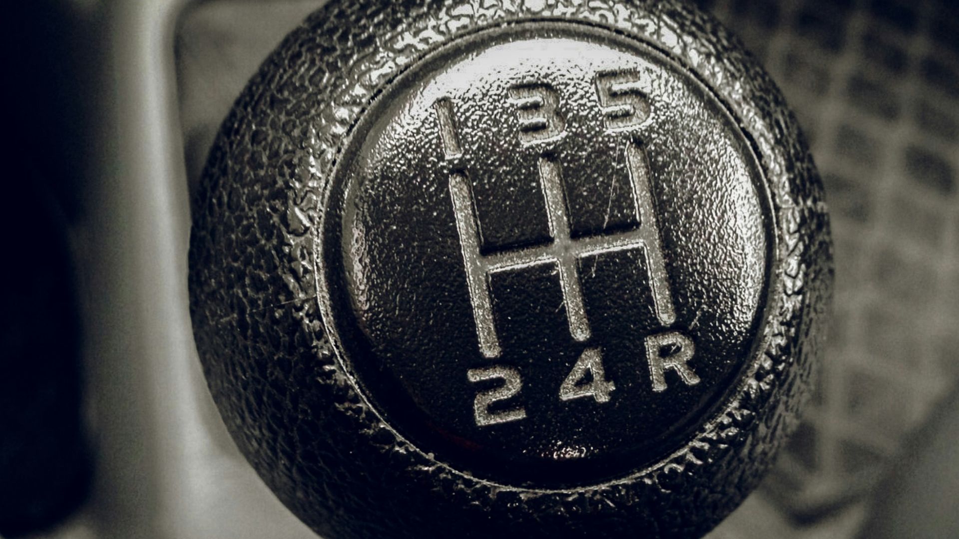 a close up of a car's gear stick
