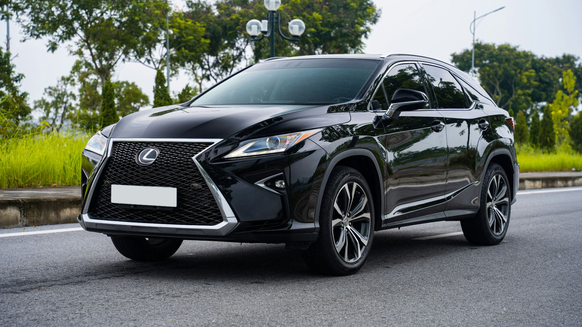 a black car parked on a road
