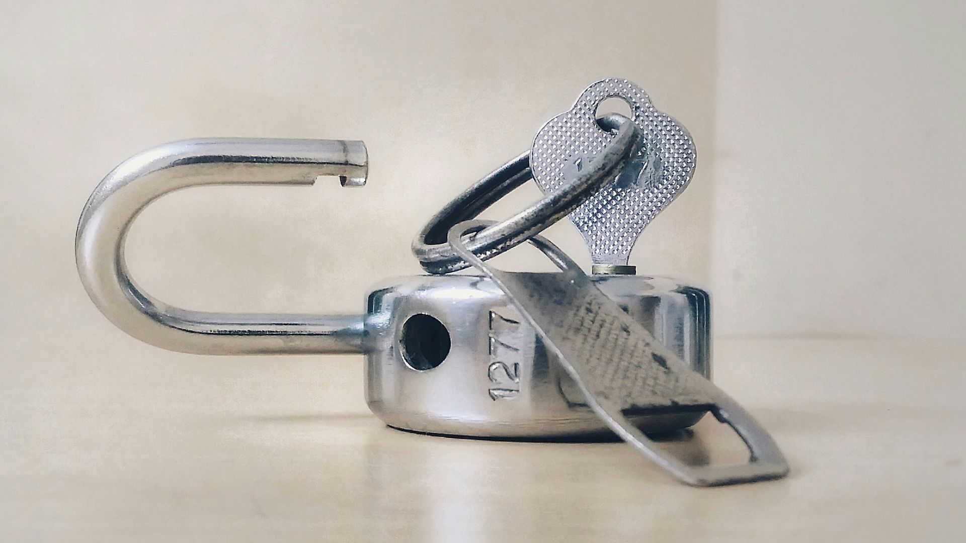 gray stainless steel padlock