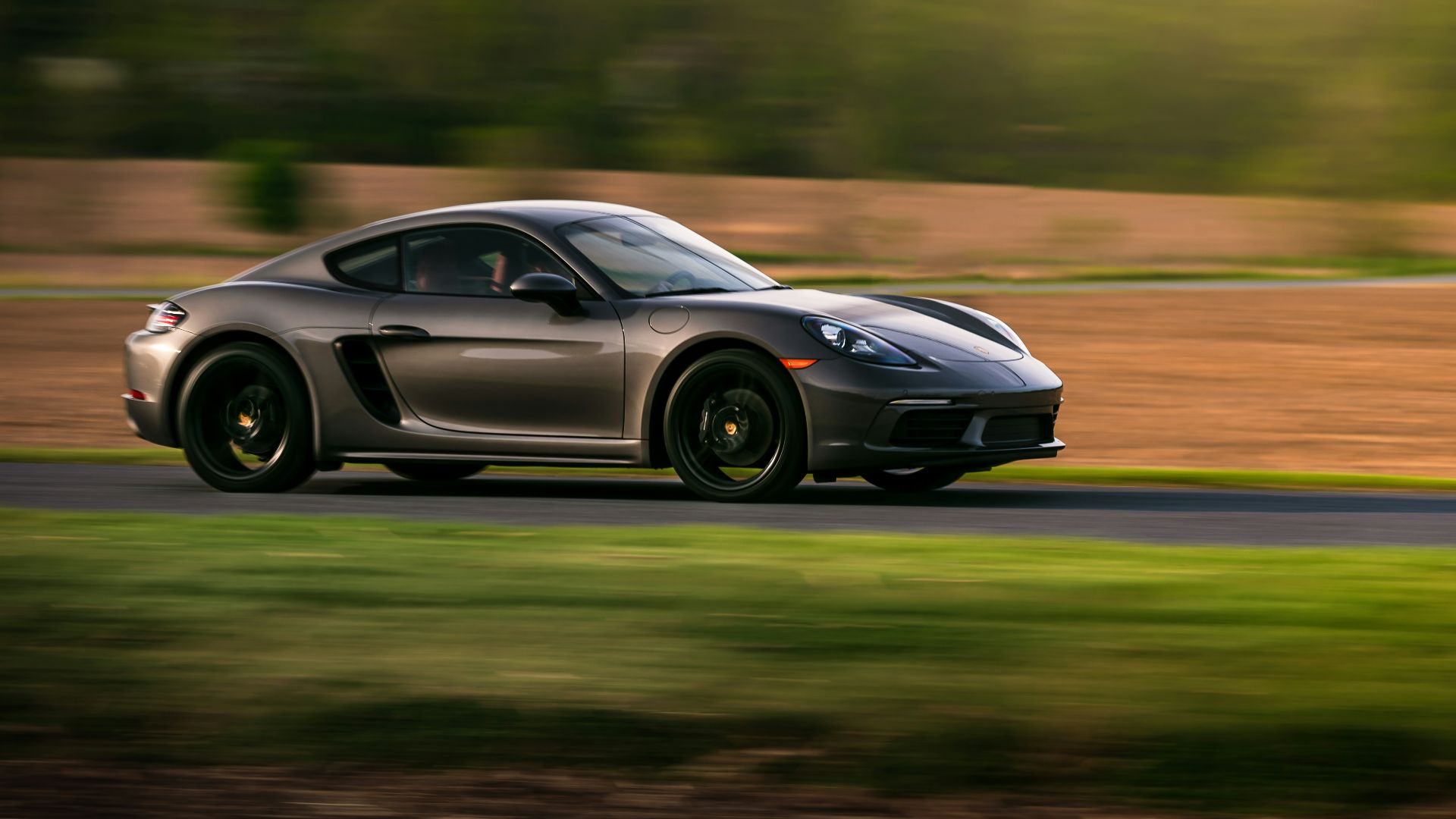black porsche 911 on road during daytime