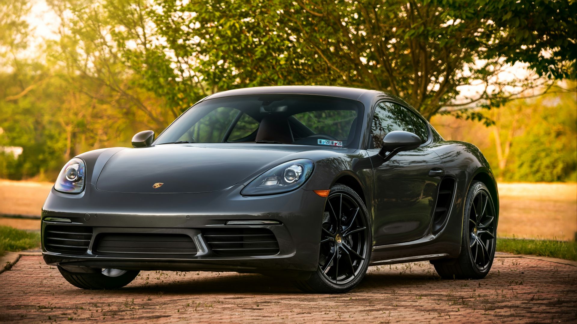 black mercedes benz coupe on road during daytime