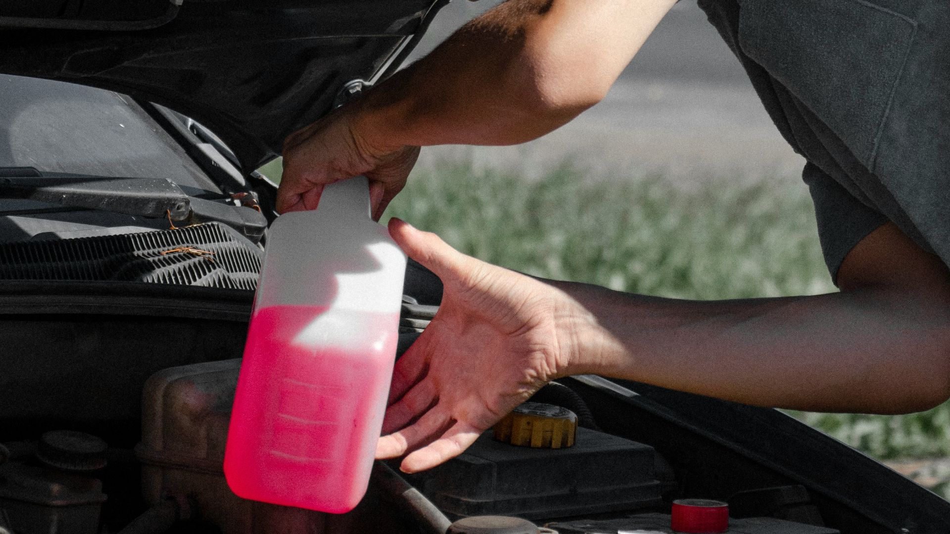 a man working on a car