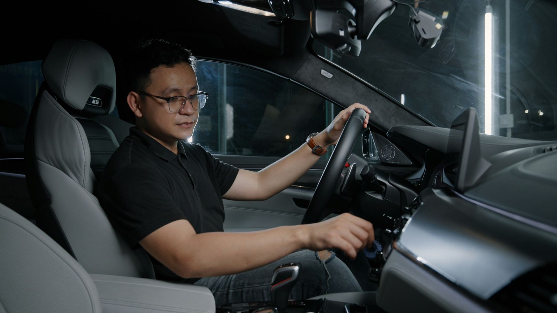 a man driving a car