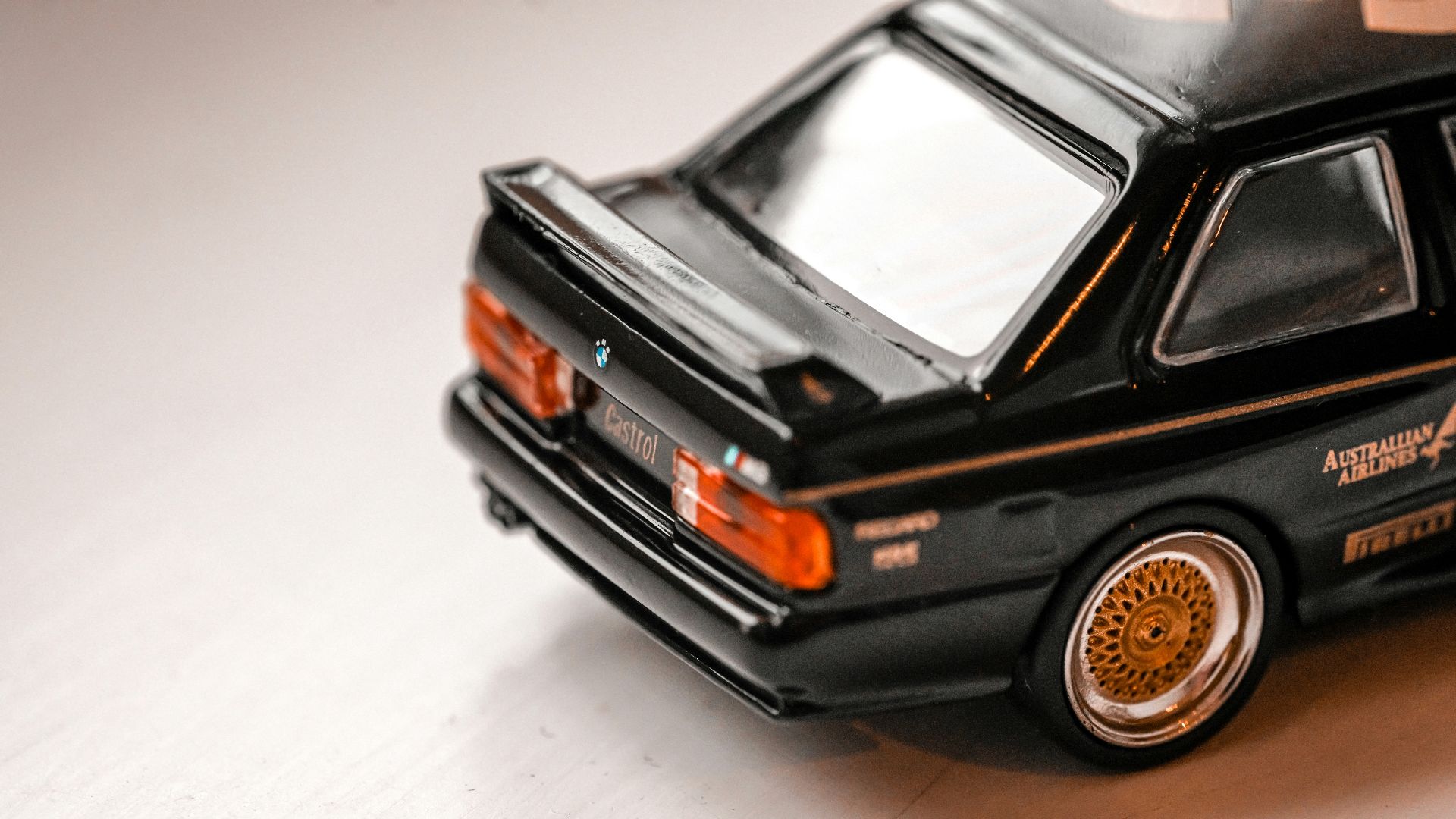 a toy car is sitting on a table