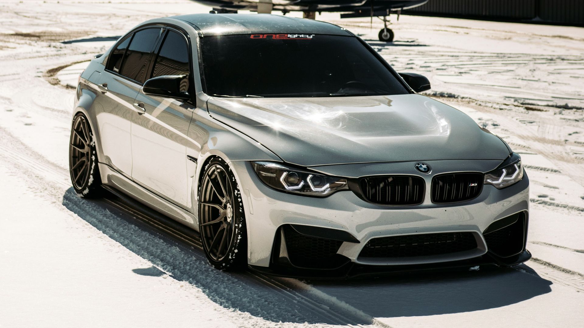 silver mercedes benz coupe on white sand during daytime