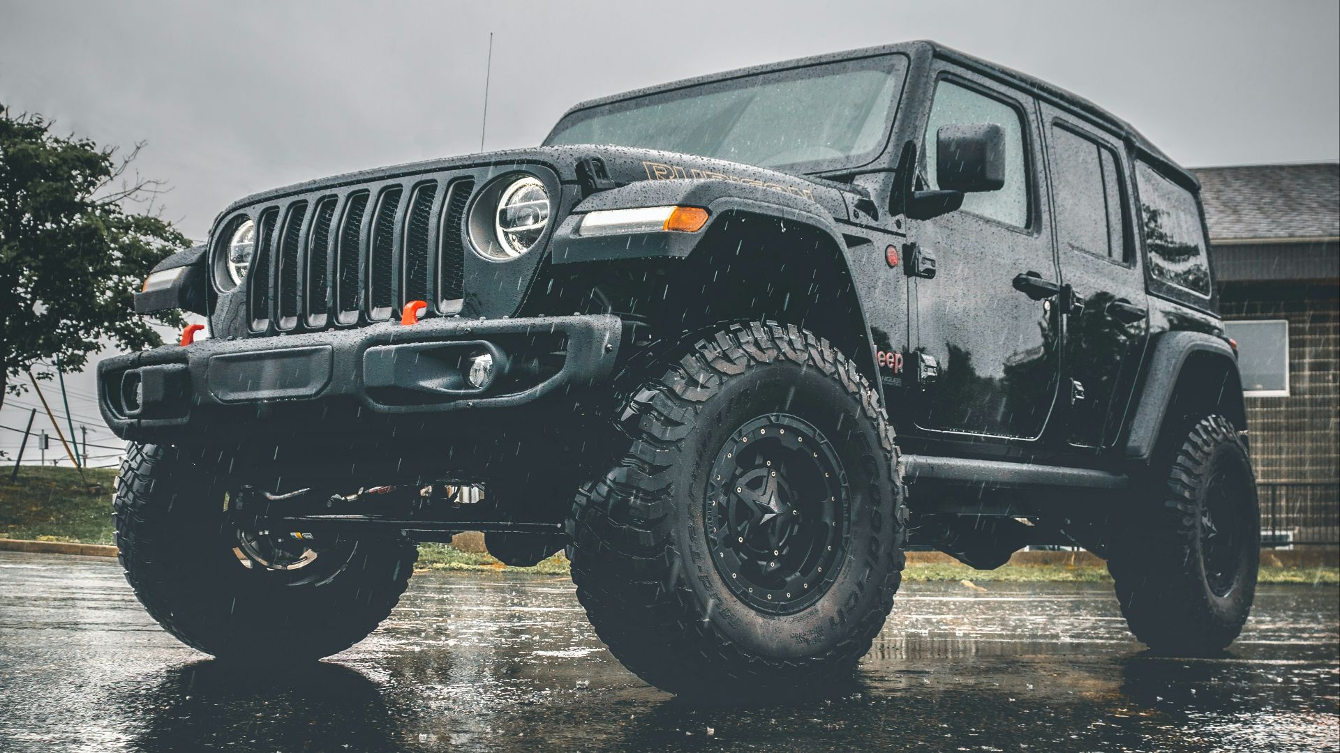 black jeep wrangler on water
