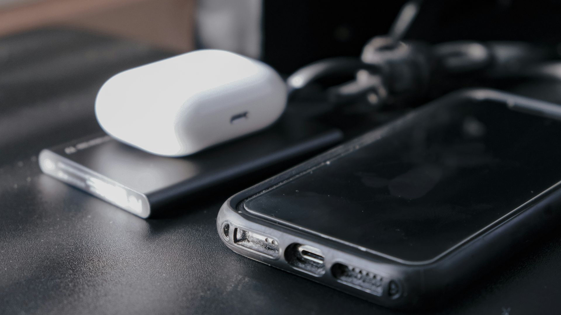 black samsung android smartphone on black table