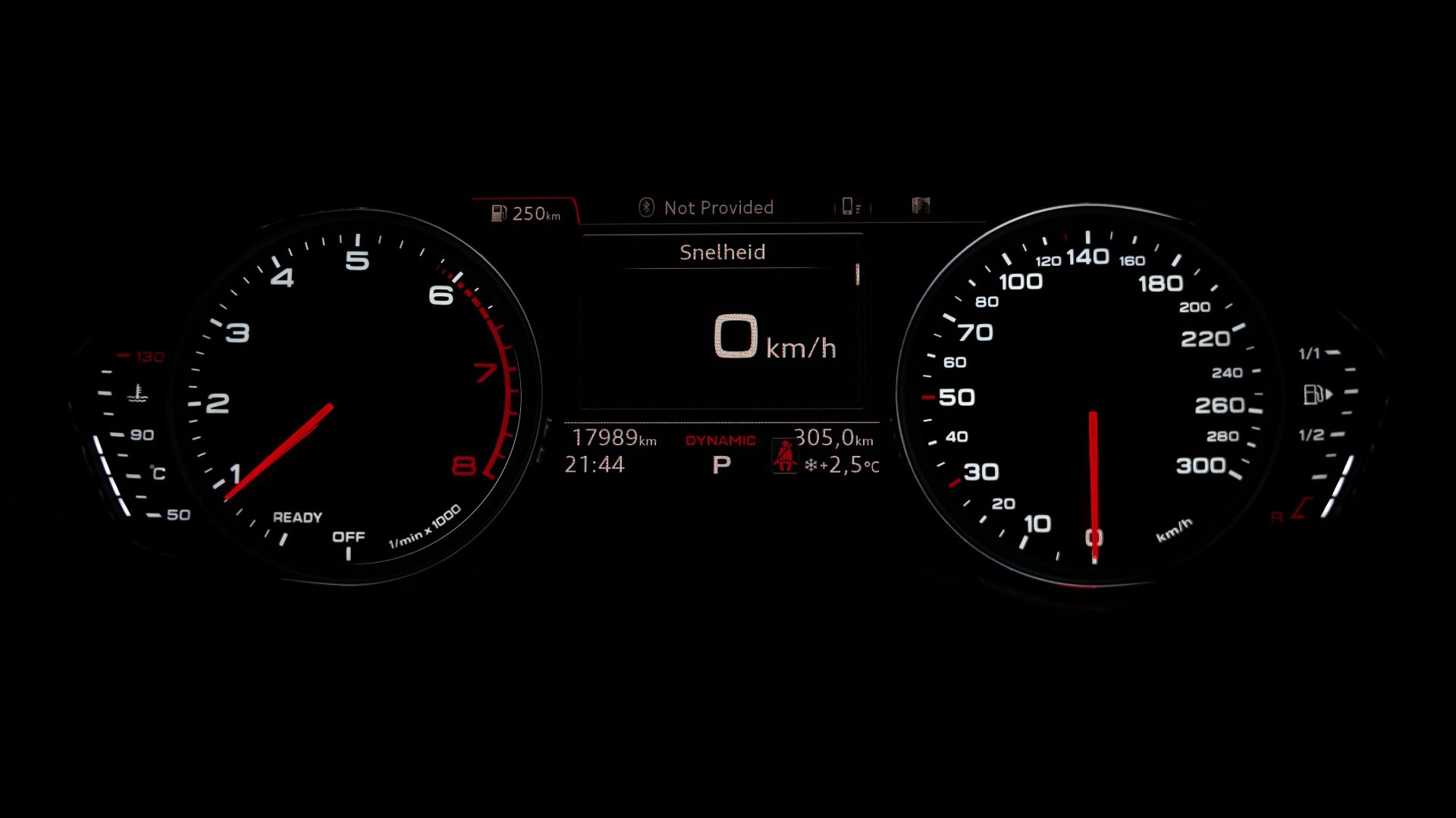 black and red analog speedometer