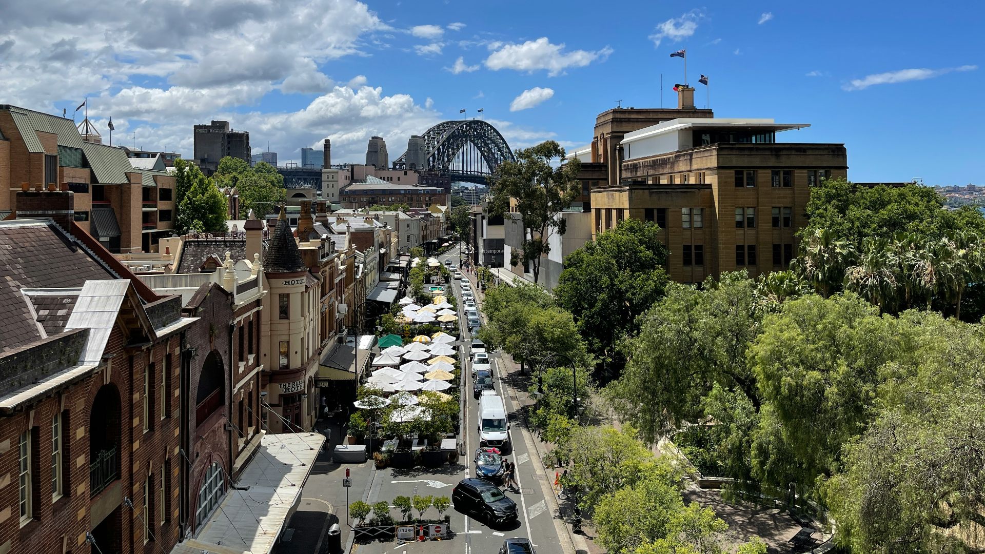 a view of a city with a bridge in the background