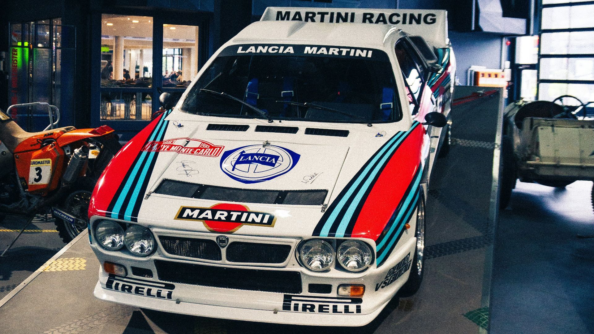 a car is on display in a museum