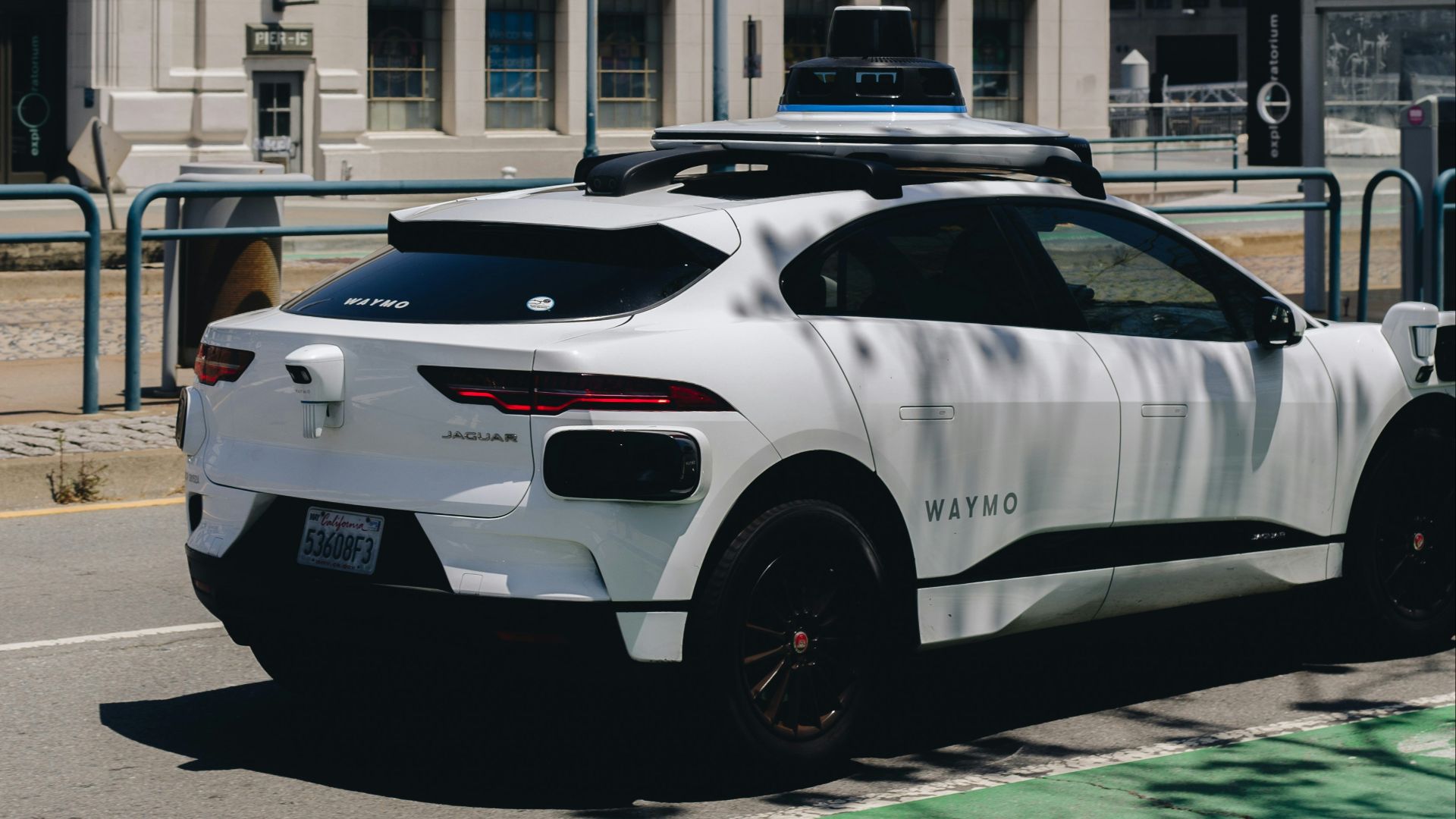 a police car parked in front of a building