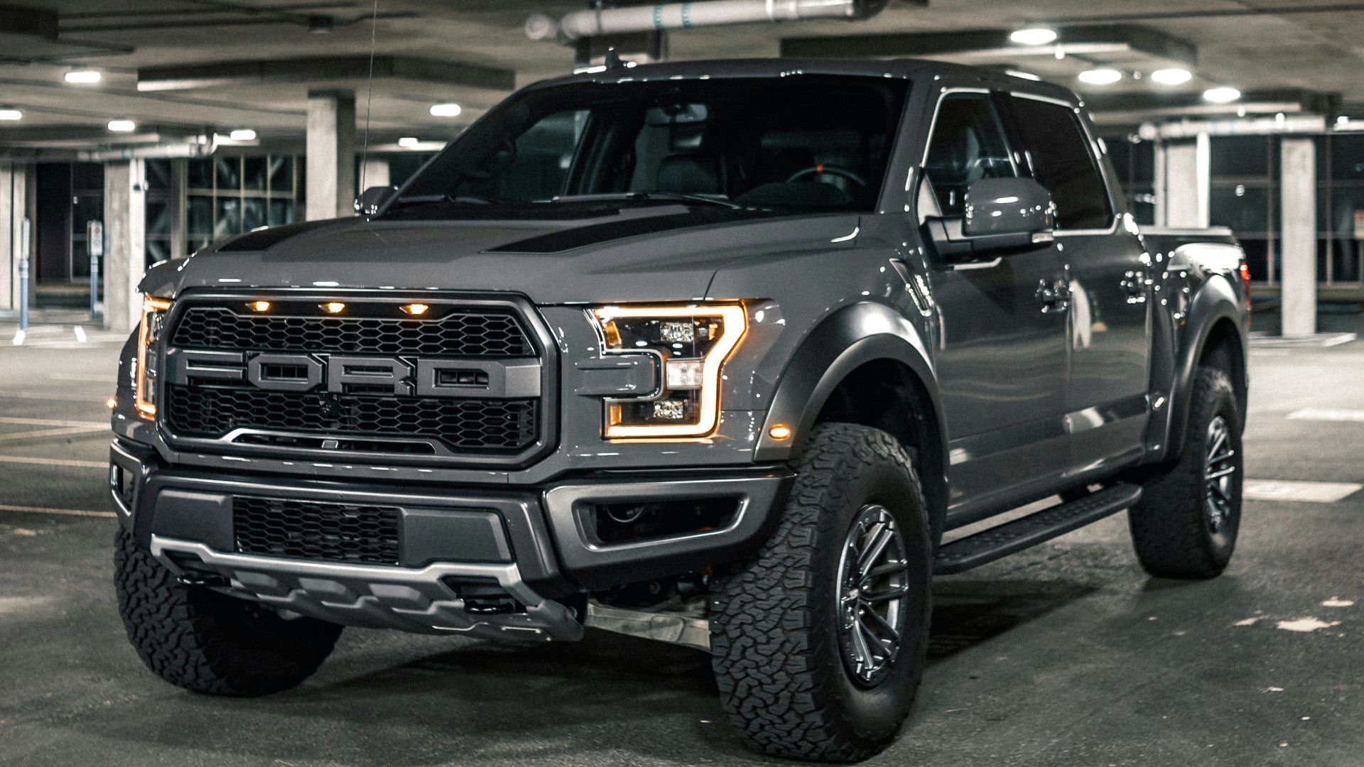 black suv in a garage